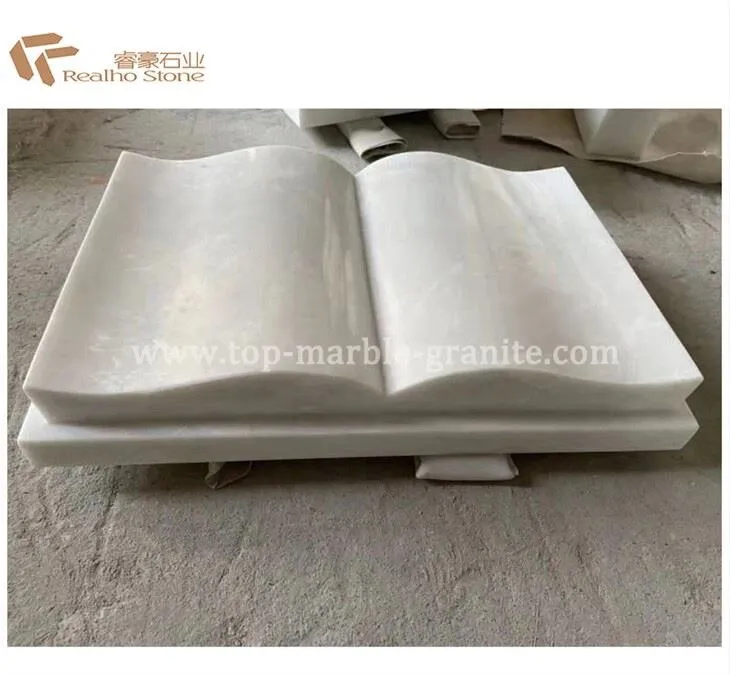 white-marble-monument-hand-and-book white-marble-monument-hand-and-book