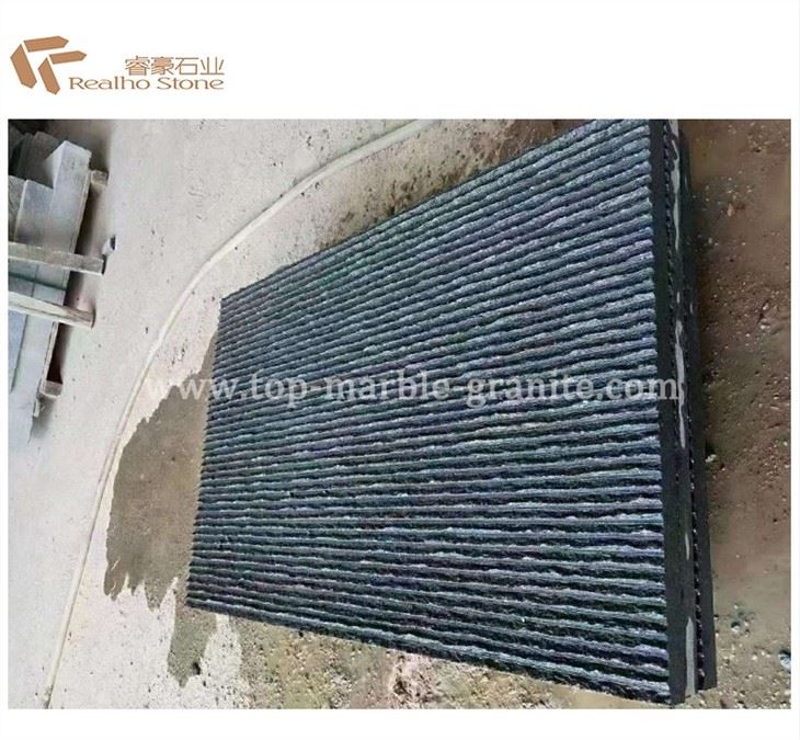 Stone tile with water flowing finish